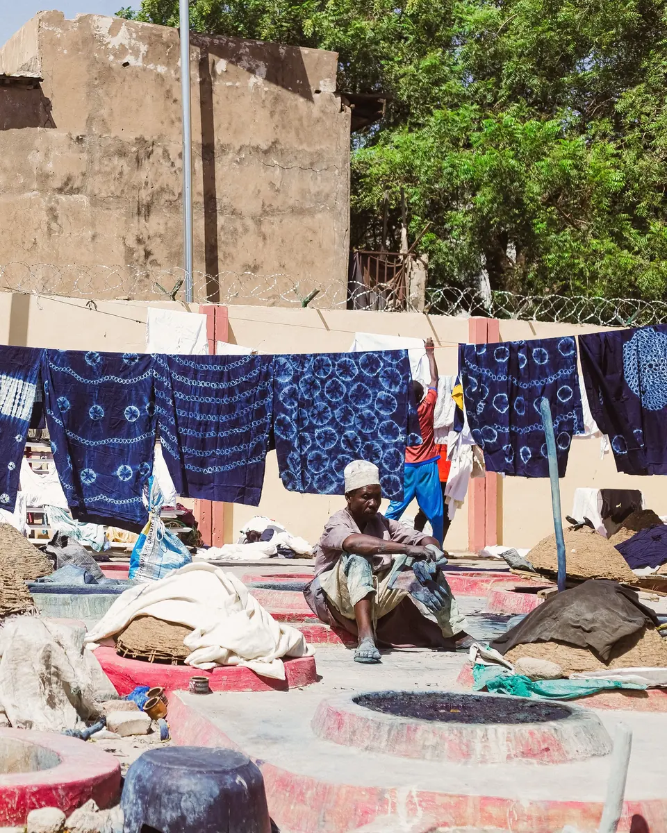 Indigo-dyed fabrics drying in the sun